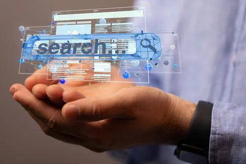 3D rendered search bar hovering over a man's hands Photos