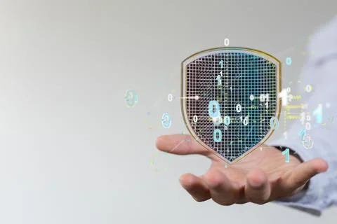3D rendered security shield floating above a hand Foto stock
