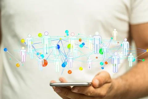 3D rendered users connected to each other held in a person's hand Stock Photos