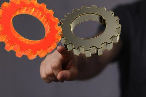 3D rendering of abstract digital gears with a blurry background Stock Photos