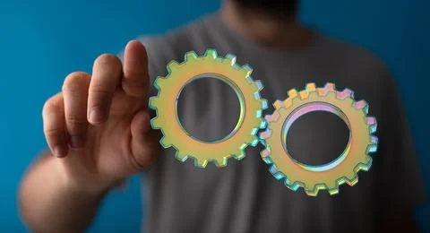 3D rendering of abstract digital gears with a blurry background Stock Photos