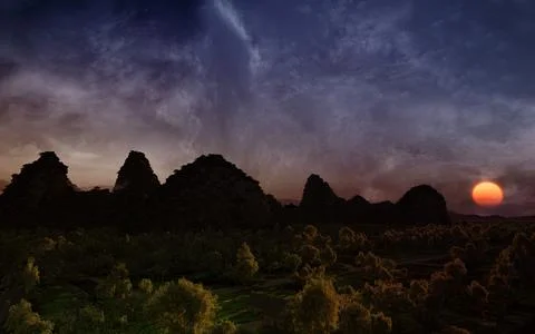 3D rendering of a beautiful landscape at dawn with the sun setting in the ba Stock Photos