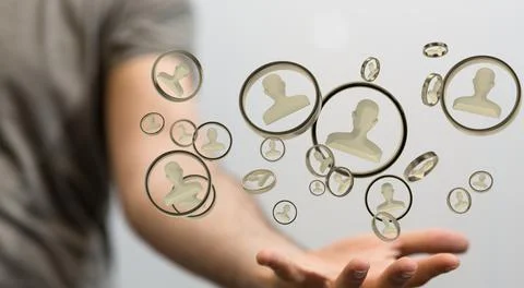 A 3d rendering of beige human profile symbols in circular frames over a hand  Stock-Fotos