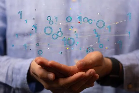 3D rendering of a binary code levitating in the air above a person's hands 스톡 사진