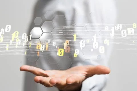 A 3D rendering of binary codes icons floating businessman's hand - digital co 写真素材
