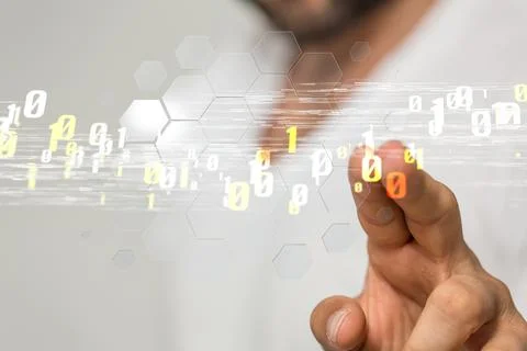 A 3D rendering of a businessman pointing on binary codes icons - digital comm 写真素材