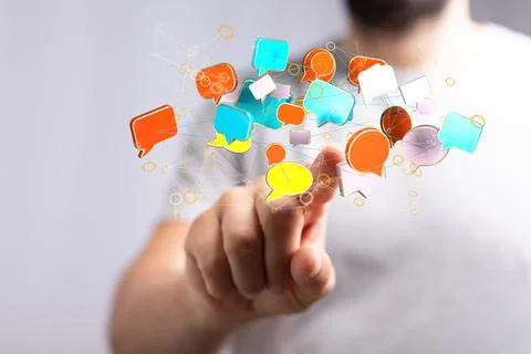 A 3D rendering of a businessman pointing at floating email icons against a da Stock Photos