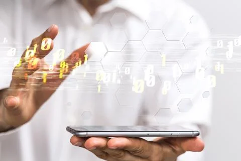 3D rendering of a businessman pressing binary codes over a mobilephone Foto stock