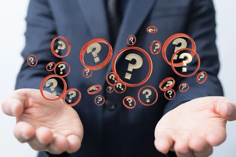 3D rendering of a Businessman solving problem with digital question marks Stock Photos