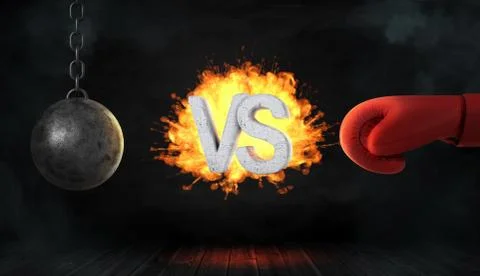 3d rendering of a concrete letters VS caught on fire between a wrecking ball and 스톡 일러스트