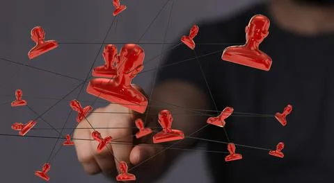 A 3D rendering of connected red icons of people; unity, group, and teamwork c Stock Photos