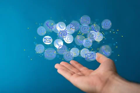 A 3D rendering of digital email and chat icons floating on hand- online commu Stock Photos
