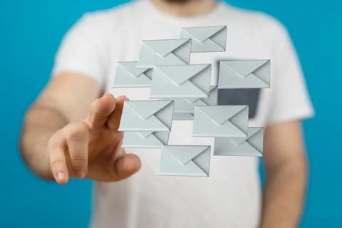 A 3D rendering of digital envelopes floating with hand tapping on it from the Stock Photos