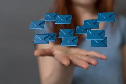 A 3D rendering of digital envelopes floating on hand- online communication co Stock Photos