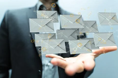 A 3D rendering of digital envelopes floating on hand- online communication co Stock Photos