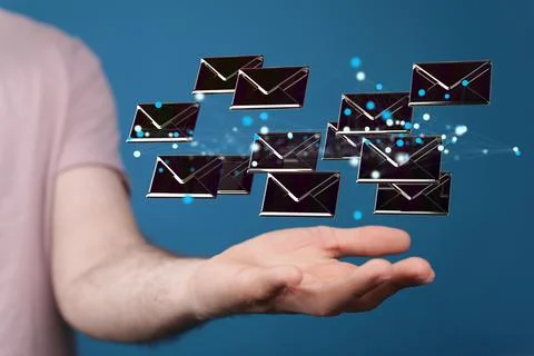 A 3D rendering of digital envelopes floating on hand- online communication co Stock Photos