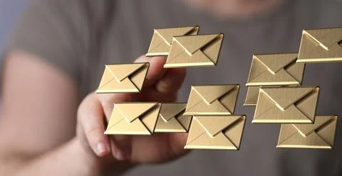 A 3D rendering of digital envelopes with hand touching it from behind- online 스톡 사진