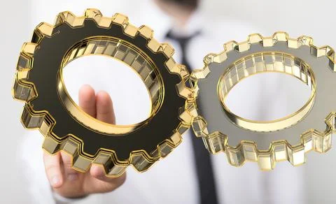 A 3D rendering of digital gears with hand touching it from behind-business ge 스톡 사진