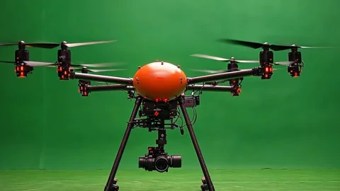 3d rendering drone with spinning propellers isolated on green screen 4k footage Stock Footage 294958491