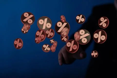 A 3d rendering of Exploding discount cubes with percent symbols in hand with  Stock Photos