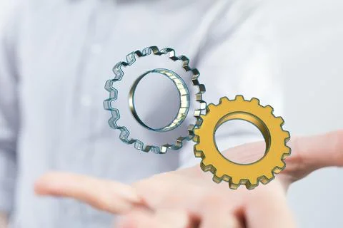3D rendering of gears with binary code hovering over a man's palm Foto stock