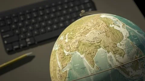 3d rendering of a globe on a desktop shows India Stock Illustration