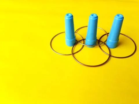 3d rendering, golden rings pattern and 3 point cap-sticks puzzle Stockfoto's