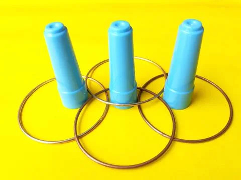 3d rendering, golden rings pattern and 3 point cap-sticks puzzle Stockfoto's