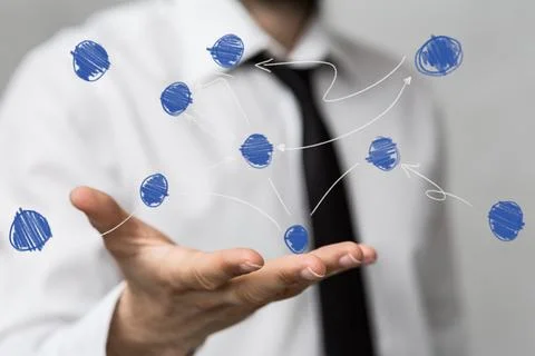 A 3D rendering hologram of interconnected dots on a businessman's palm - netw Stock Photos
