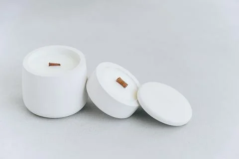 3D rendering. Model Empty white Candle in Plaster Jar. Two candles on Gray Ba Stock Photos