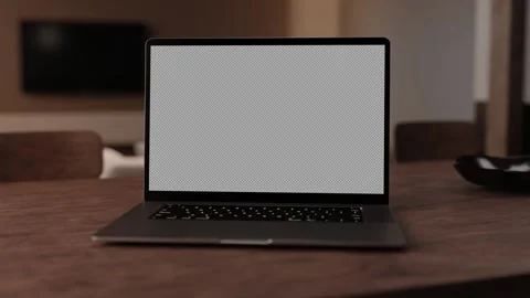 A 3D rendering of a modern laptop on a table in home office with matte on screen 스톡 동영상 243974172