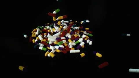 3D rendering multicolored medical pills	 Stock Illustration