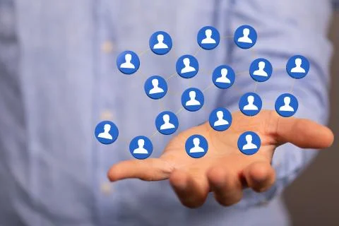 A 3D rendering of people silhouettes in the network team with a real person h Stock Photos