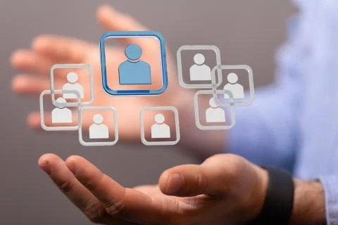 A 3D rendering of people silhouettes in the network team with a real person h Stock Photos