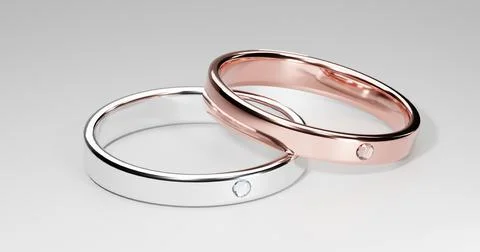 3D rendering of realistic minimal diamond rings. Silver and rose gold color s Stock Illustration