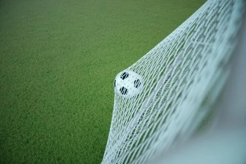 3d rendering soccer ball in goal. Soccer ball in net with spotlight and stadium Illustrazione stock