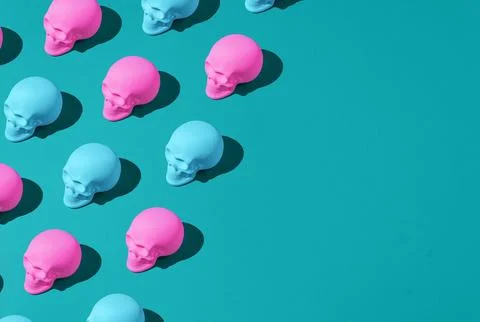 3D rendering of a spooky pattern of skulls isolated on a blue background, the co Illustrazione stock