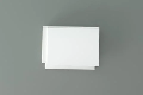 3d rendering of stacks of A4 papers with copy space over a gray background イラスト素材