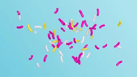 3D rendering of sugar sprinkle dots falling decoration for cake and bakery Stock Photos
