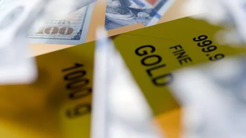 A 3d rendering of torn US dollar bills floating around a gold bullion bar Stock Illustration