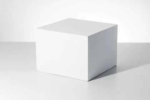 3D rendering of a white empty cube with mockup against a white background Stock Illustration