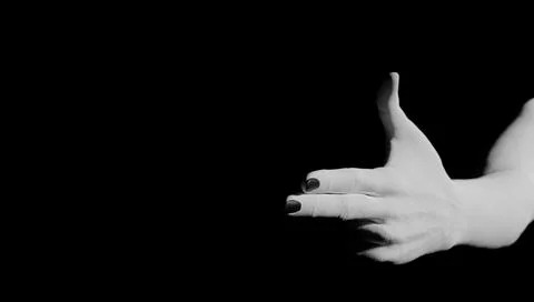 3d rendering of a woman's hand making the pistol sign while shooting. Stock Photos