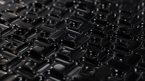 3D Shiny Round Pattern Background Loop with Depth of field Side View Black Metal Stock Footage 109380284