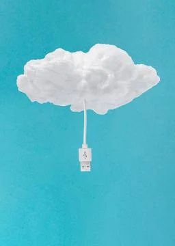 3D of soft fluffy cloud with computer connection cable against a blue background Stock Illustration