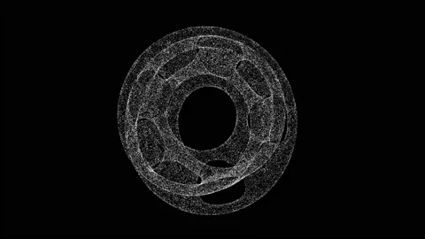 3D space figure rotates on black bg. Object dissolved white flickering particles Video stock 235945644