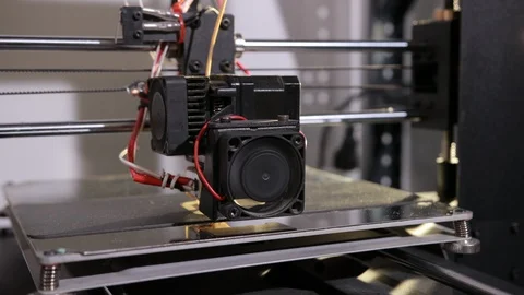 3D technology the printer head prints a plastic part Stock Footage 124375985