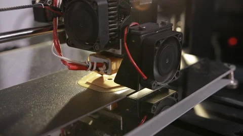 3D technology the printer head prints a plastic part Stock Footage 125131598