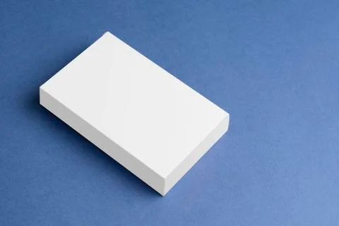 3d white box on blue background mock-up series Stock Photos