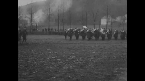 3rd Bn, 5th U.S. Marines pass before Maj Lejeune and Brig Kilbourne 1918-1919 Stock Footage 98954030