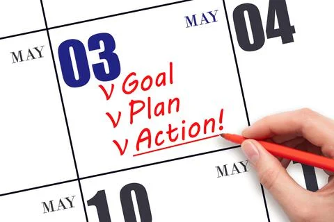 3rd day of May. Hand writing text GOAL PLAN ACTION  on calendar date May 3. M Stock Photos